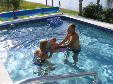 Grandma and Grandpa play with Ella