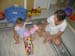 Ella opens up her birthday gift