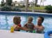 Grandma Daddy and Ella play in the pool